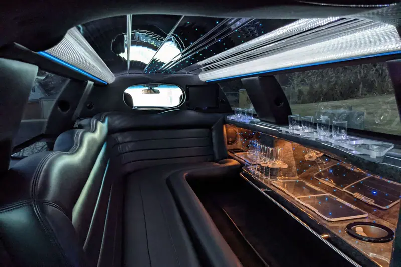 Inside a stretch limousine with ceiling lights