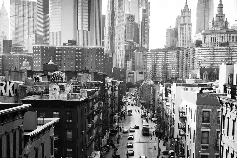 Black and white view down a New York street