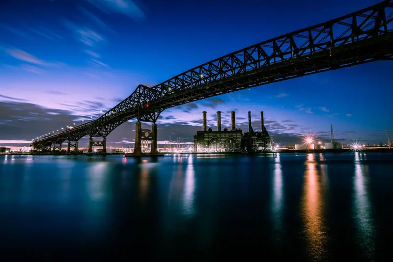 Steel bridge over the water in New Jersey at dusk