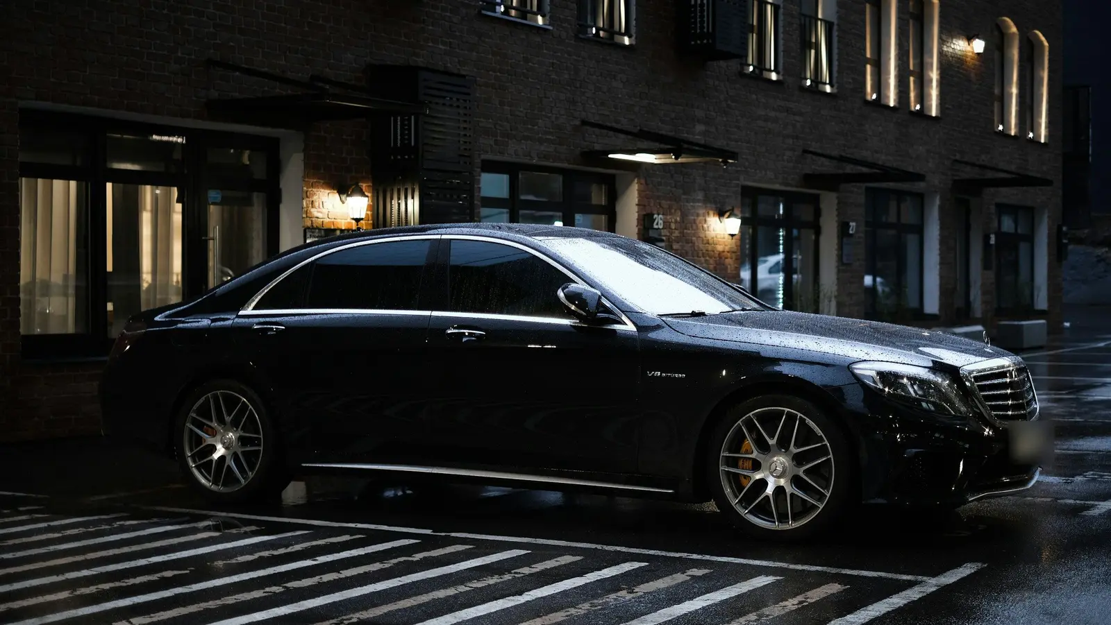 Black Mercedes-Benz chauffeur car